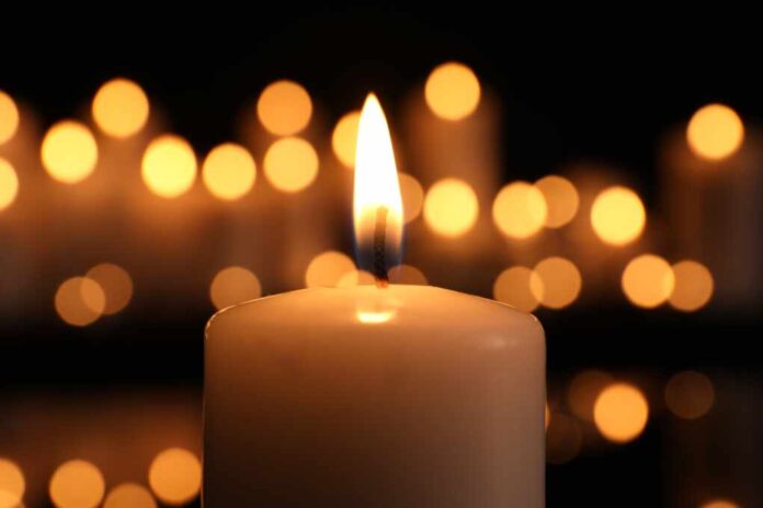 Burning,Candle,In,Darkness,,Closeup.,Memory,Day