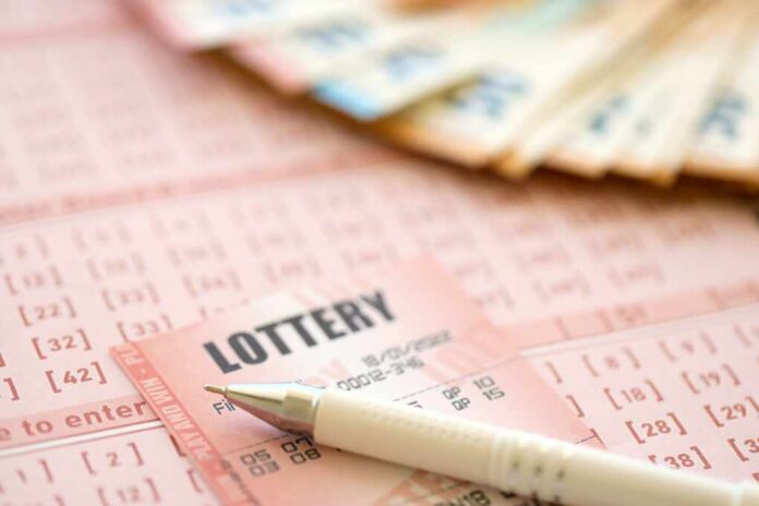 Lottery,Ticket,And,Gambling,Receipt,On,Table,With,Pen,And