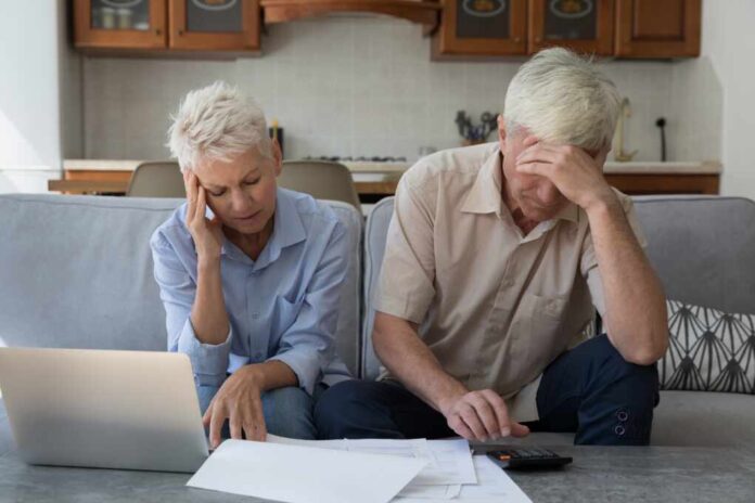 Older,Stressed,Unhappy,Wife,And,Husband,Manage,Family,Finances,Feeling