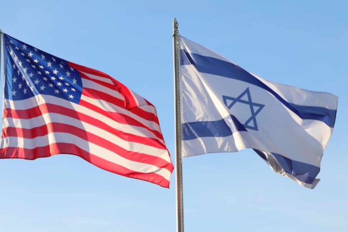 Two,Large,American,And,Israeli,Flags,Flying,In,The,Sky