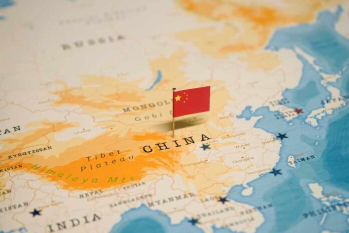 The,Flag,Of,China,On,The,World,Map.