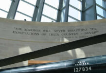 Young Marine’s Tragic Loss in Caribbean Deployment A quote honoring the Marines displayed on a wall in a memorial space