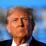 Greenland Stands Firm Against Trump’s Viral Offer Close-up portrait of a serious-looking political figure outdoors