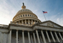 View of the U.S. Capitol building with an American flag flying