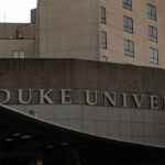 Signage of Duke University on a building