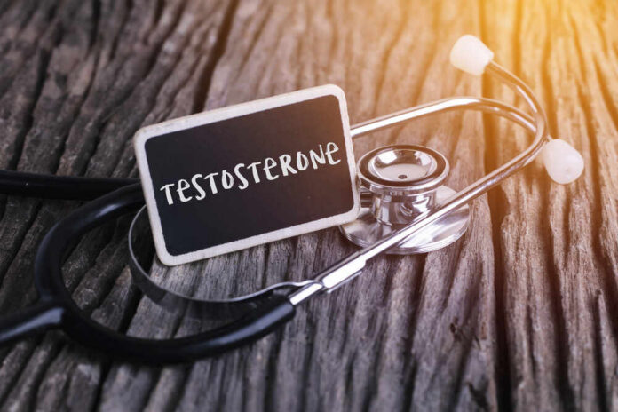 A stethoscope next to a chalkboard sign that reads 'Testosterone'