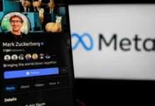 Close-up of a social media profile on a mobile device featuring a smiling individual and a Meta logo in the background