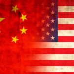 Flags of China and the USA blended together with a textured background