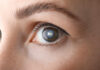 Close-up view of a human eye showcasing the iris and eyelashes