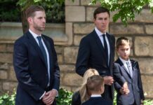 Hunter vs. Trump Jr.: Real Fight or Viral Hoax? A group of men and children in formal attire standing outdoors, appearing serious