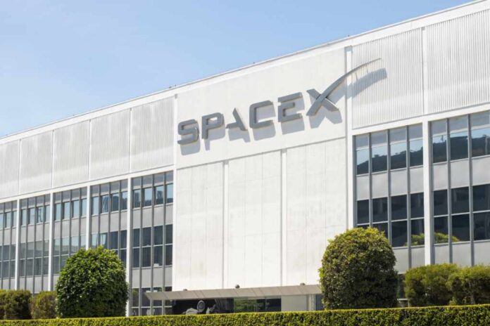 shutterstock_2409679515.jpg Exterior view of the SpaceX building with a prominent logo