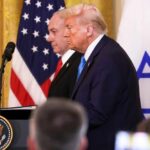 U.S. Ties Drag Deeper into Israeli Defense Donald Trump and another official at a press conference with flags in the background