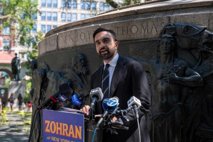 A man delivering a speech at a podium during a public event