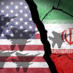 A cracked wall featuring the flags of the USA and Iran with military aircraft silhouettes