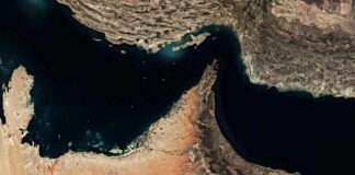 Aerial view of a coastal area with contrasting land and water features