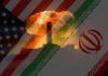 U.S.-Backed Strikes CRIPPLE Iran’s Steel Industry An artistic representation of the US and Iran flags with a nuclear explosion in the background