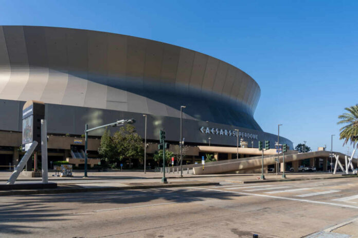 Exterior view of the Caesars Superdome in New Orleans on a clear day