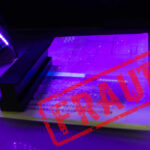 $215 Million Email Fraud Network Dismantled A passport under UV light with a stamp indicating fraud