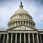 Dying Congressman DEMOLISHES His Own Party The U.S. Capitol building with an American flag flying in front