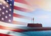 A submarine partially submerged in water with an American flag overlay