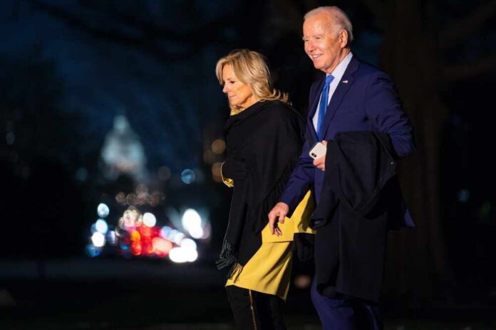 Washington,,Dc,,Usa,-,January,23,,2024:,U.s.,President,Joe Joe and Jill Biden walking together outdoors at night