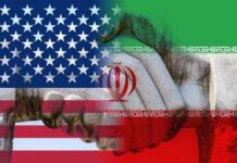 Iran War ‘Over’? Read The Fine Print Handshake overlaid with United States and Iran flags