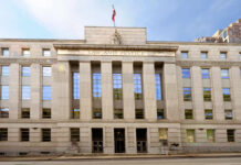 TV Clash Exposes Rot at the Top Facade of a government building with the words Law and Justice and a statue on top