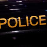 State-Enabled Rape Gangs Alleged Close-up of a police vehicle with the word 'POLICE' prominently displayed
