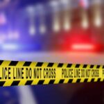 Fly‑Tipped Trap Leaves Cyclist Skull‑Shattered Yellow police tape reading 'DO NOT CROSS' at a crime scene