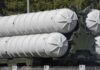Kim Pushes Mass Production—Verification Vanishes Close-up of a military missile system with cylindrical launchers