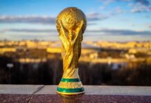 Golden soccer world cup trophy outdoors