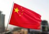 Waving flag of China with a star and four smaller stars