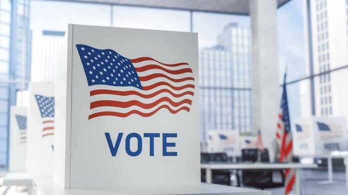 Voting booth with American flag design in a modern polling place
