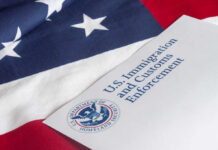 U.S. flag with a document from U.S. Immigration and Customs Enforcement