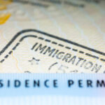 Close-up of a residence permit showing immigration details