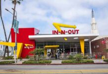 Gunfire, Panic—But Who Killed The Shooter? In-N-Out Burger restaurant exterior with red and yellow design