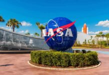 NASA globe sign at visitor complex entrance