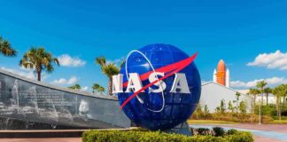 NASA globe sign at visitor complex entrance