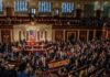 House chamber filled with lawmakers during a session