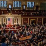 House chamber filled with lawmakers during a session