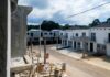 Row of newly built townhouses on a construction site