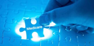 Hand placing a puzzle piece labeled Medicare