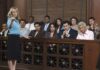 Attorney pointing toward the jury in a courtroom