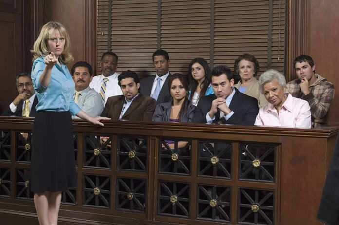 Attorney pointing toward the jury in a courtroom