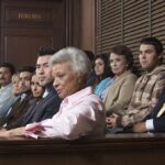 jury seated in a courtroom box