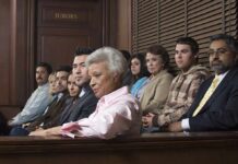 jury seated in a courtroom box