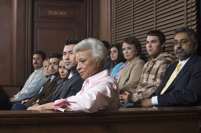 jury seated in a courtroom box