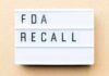 Serious Recall Hits Freezers Now – 6 Hospitalized Lightbox sign reading FDA recall on beige background