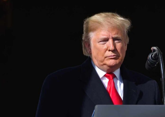 Donald Trump at a podium with a microphone