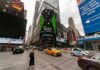 Times Square street with taxis, billboards, and skyscrapers